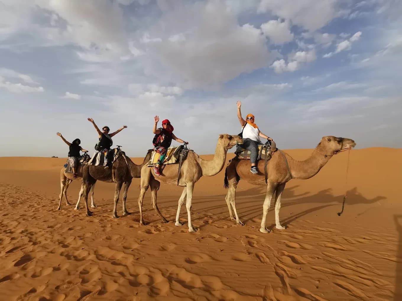 Group of travellers on camels