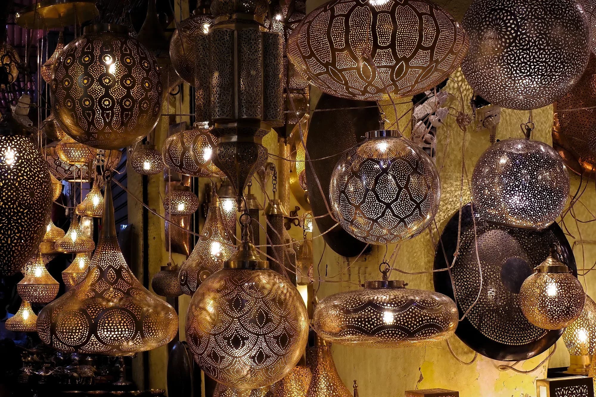Pierced metal lanterns hanging in the blacksmiths' souk (Haddadine) in the Marrakech medina