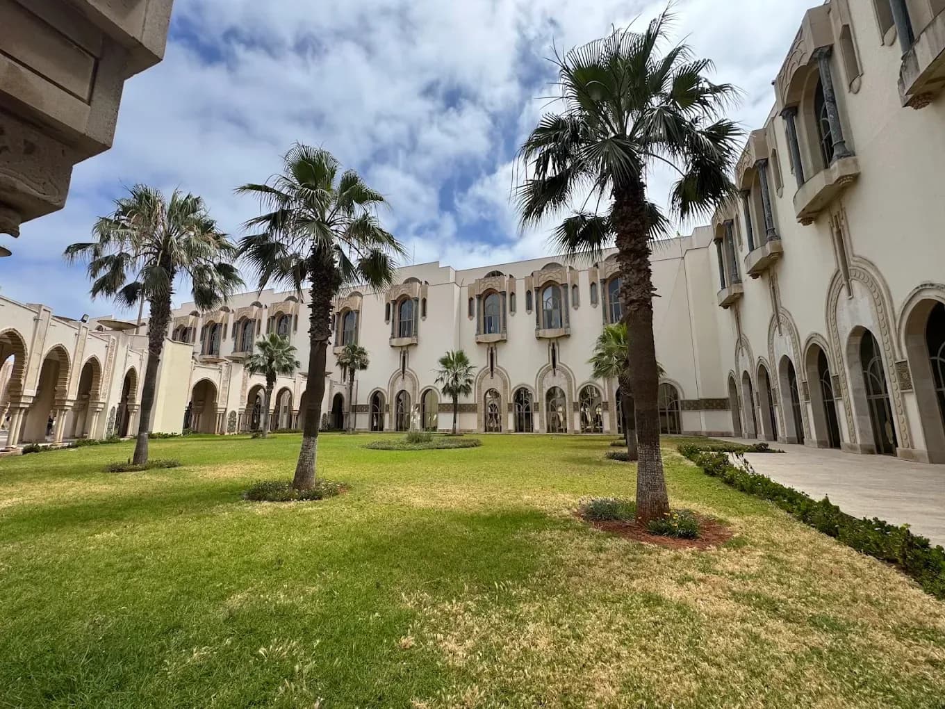 Garden with arches and palm trees
