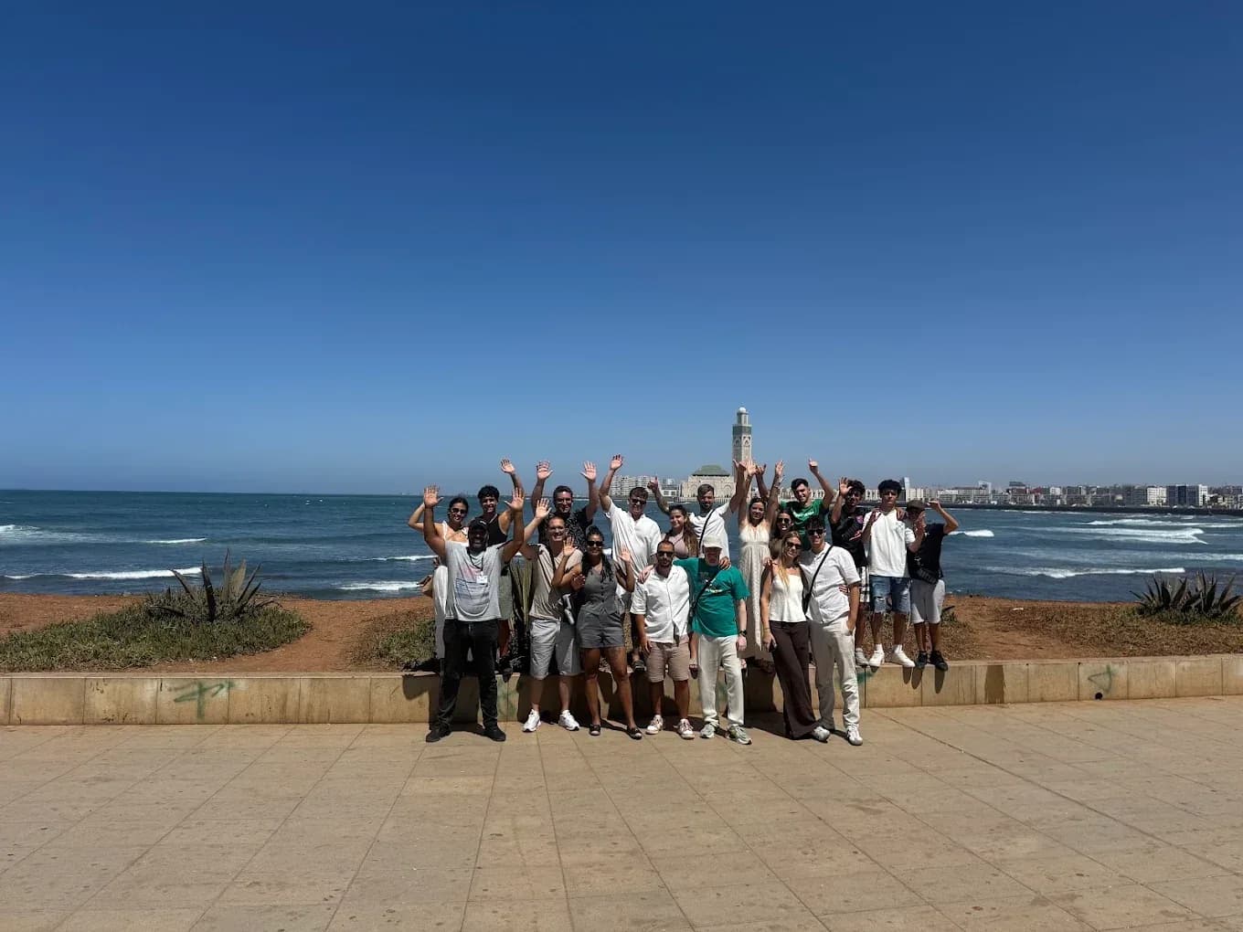 Group of travellers by the sea