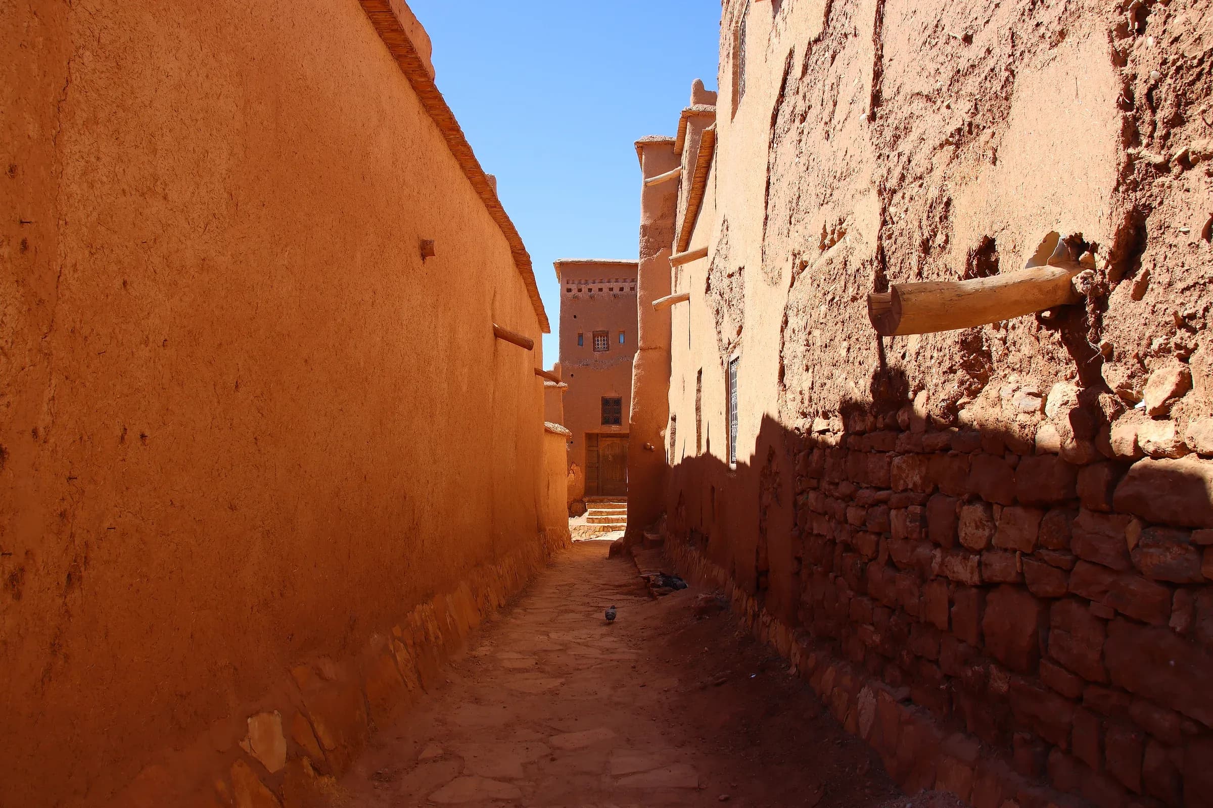 Narrow alley between mud-brick walls inside the ksar of Aït Ben Haddou