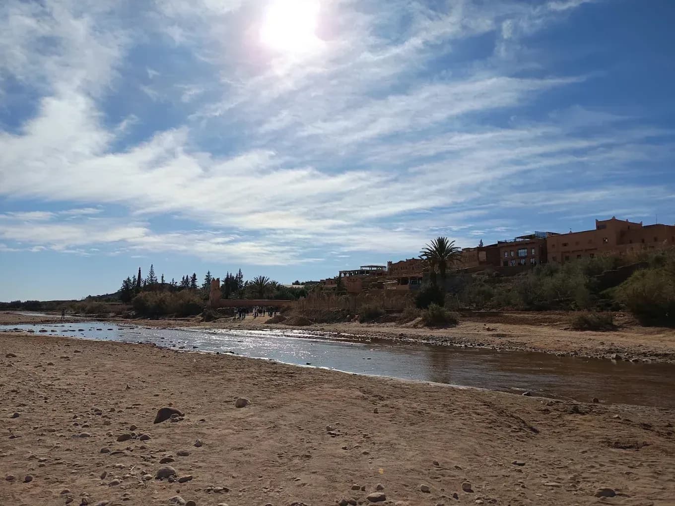 Riverbed with kasbahs in the background