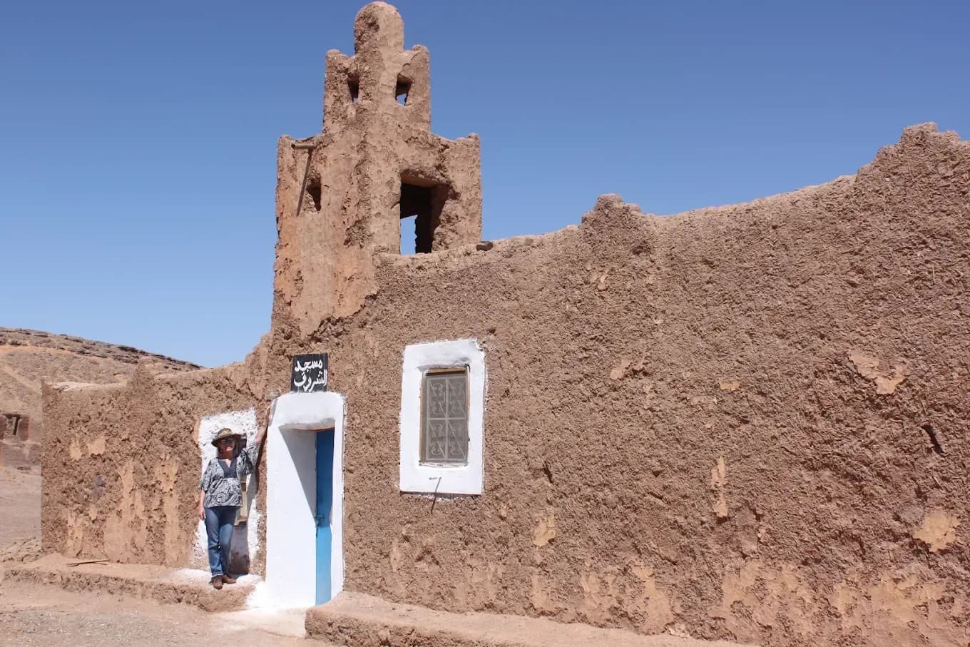 Mud-brick nomad village on the edge of the desert