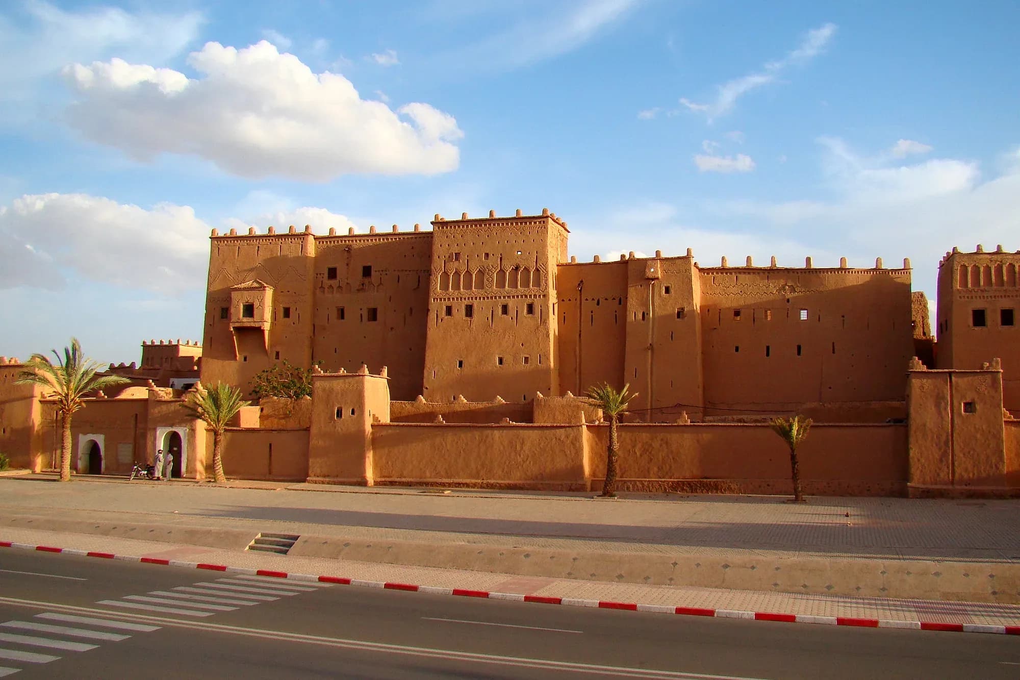 Mud-brick facade with towers of the Taourirt kasbah in Ouarzazate