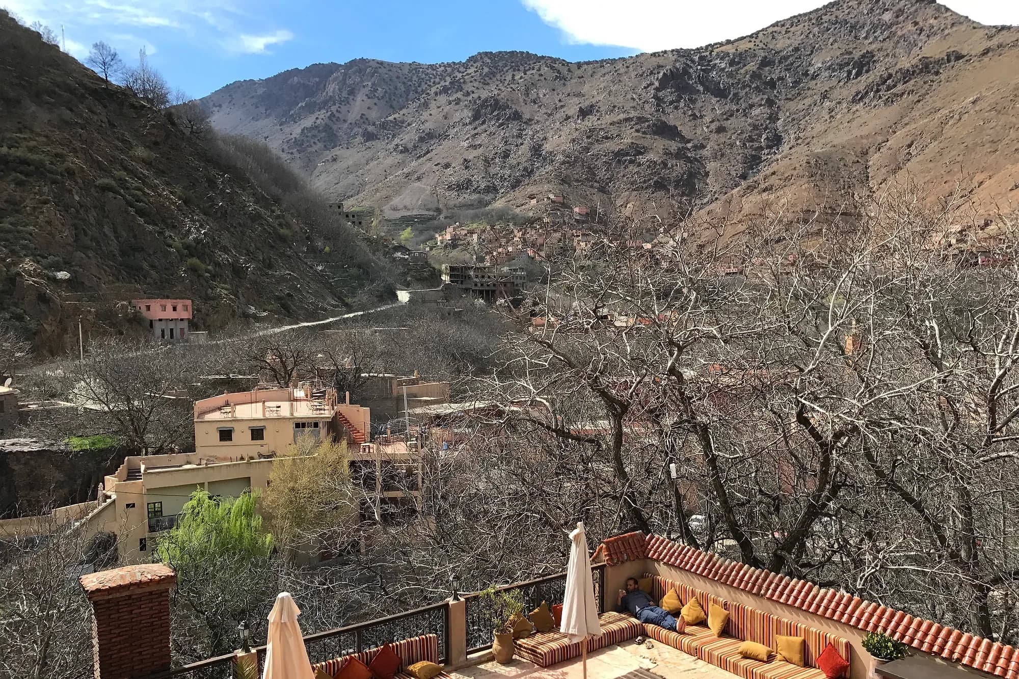 Terrace with cushions at a lodge in Imlil facing the High Atlas mountains