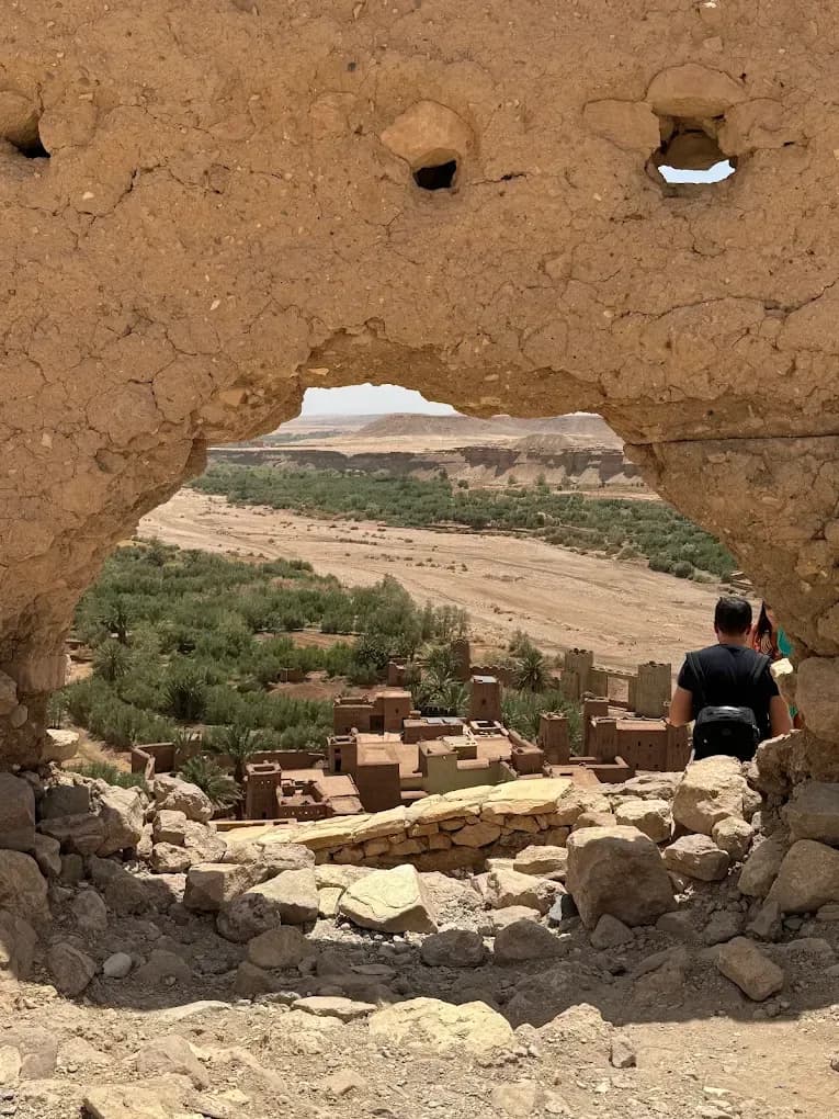 Berber village seen through a mud-brick arch