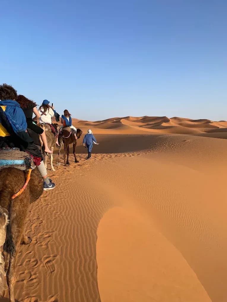 Camel ride across the dunes