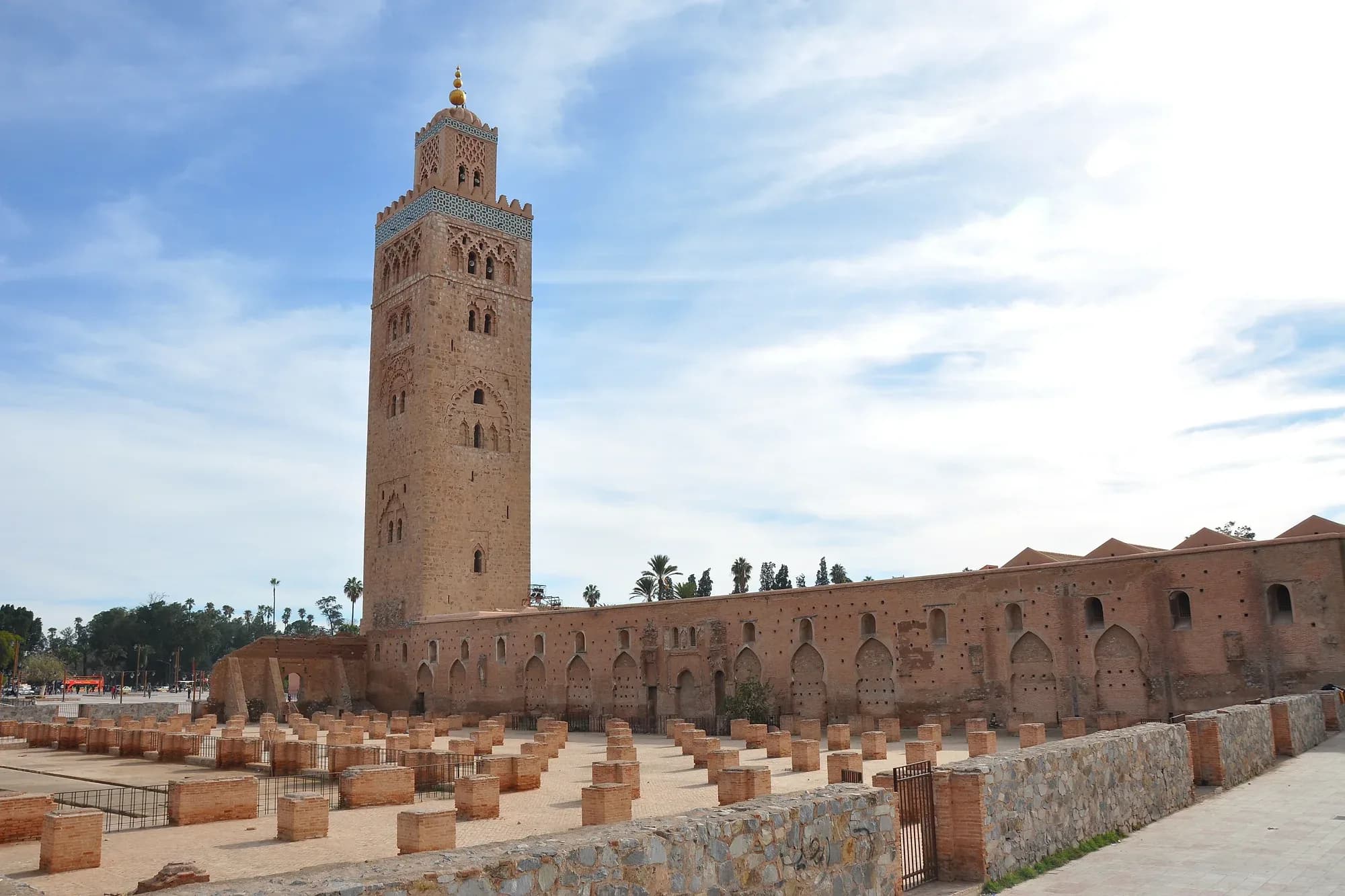 Koutoubia mosque and its minaret next to the ruins of the first mosque, Marrakech